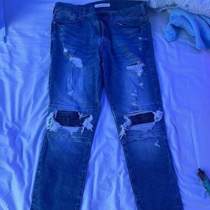Blue ripped biker jeans
